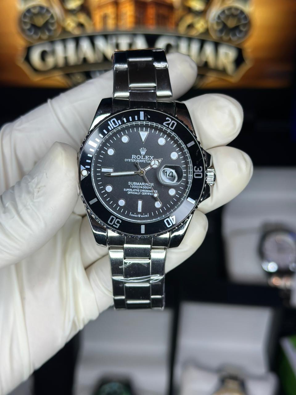 BLACK AND SILVER ROTATING DIAL ROLEX