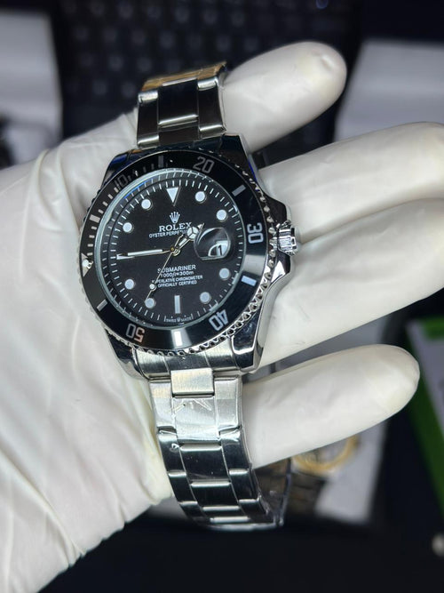 BLACK AND SILVER ROTATING DIAL ROLEX