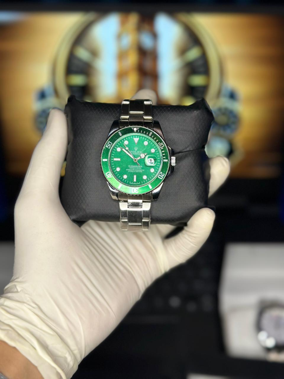 GREEN ROTATING DIAL ROLEX