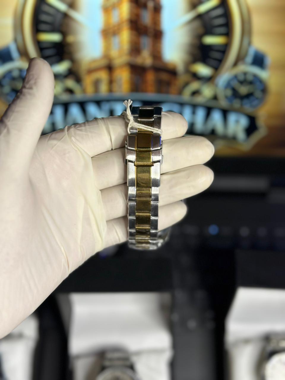 GOLDEN ROTATING DIAL ROLEX