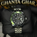 Rolex watch with green bezel held by a gloved hand in front of 'Ghanta Ghar' sign.